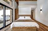 Experience rustic elegance in this stunning bedroom.
