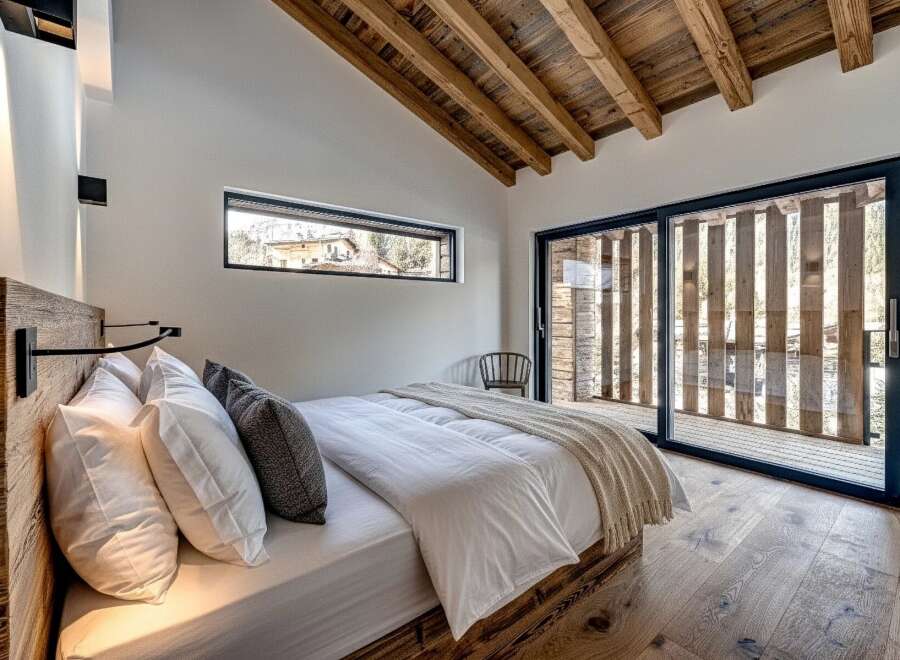 Experience the epitome of rustic elegance in this stunning bedroom.