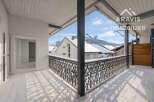 Enjoy breathtaking mountain views from this charming balcony.