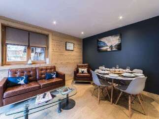 Experience the charm of this cozy living space, perfect for relaxation and entertaining.