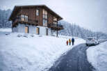 This stunning chalet-style home offers a perfect blend of rustic charm and modern luxury.
