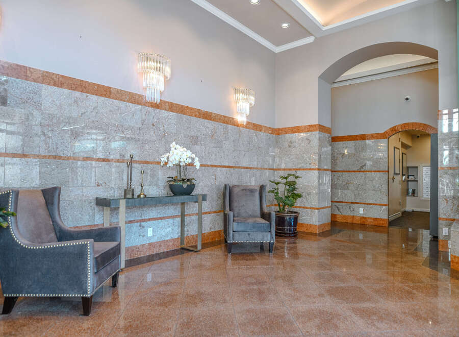 Step into luxury with this stunning lobby, showcasing elegant design and high-end finishes.