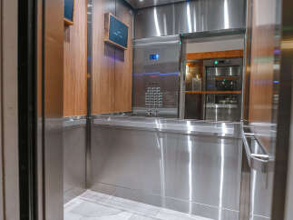 Step into luxury with this elevator, a seamless blend of modern design and functionality.