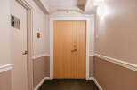 This inviting hallway showcases a well-maintained entrance, perfect for welcoming guests.