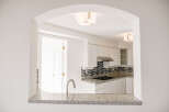 This stunning kitchen boasts modern design and functionality.
