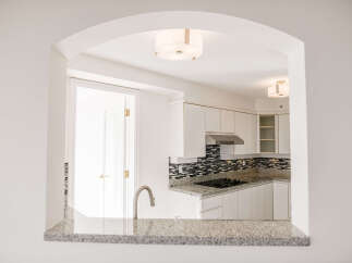 This stunning kitchen boasts modern design and functionality.