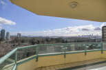 Enjoy breathtaking city views from this stunning balcony.