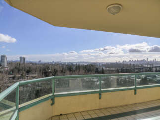 Enjoy breathtaking city views from this stunning balcony.