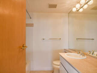 This bathroom features a clean and bright design, perfect for a relaxing space.
