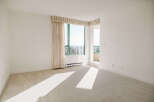 This bright and airy room features a large window that lets in plenty of natural light.