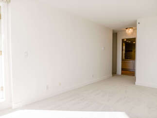 This bright and airy room offers a blank canvas for your design vision.