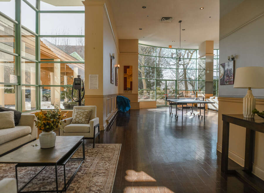 This stunning property boasts a bright and airy lobby, perfect for welcoming guests or enjoying a moment of relaxation.