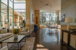 This stunning property boasts a bright and airy lobby, perfect for welcoming guests or enjoying a moment of relaxation.