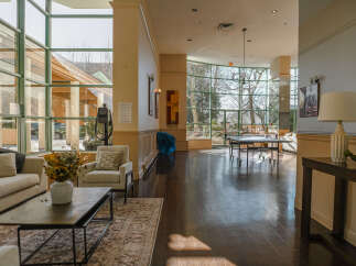 This stunning property boasts a bright and airy lobby, perfect for welcoming guests or enjoying a moment of relaxation.
