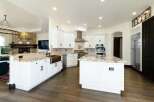 This stunning kitchen boasts a modern design with high-end finishes.