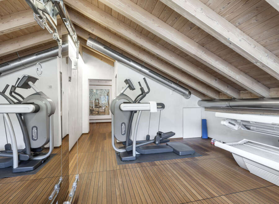 This stunning property boasts a state-of-the-art home gym, perfect for maintaining a healthy lifestyle.