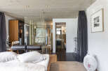 Experience luxury living in this stunning property, featuring a modern bedroom with a spa-like bathroom.