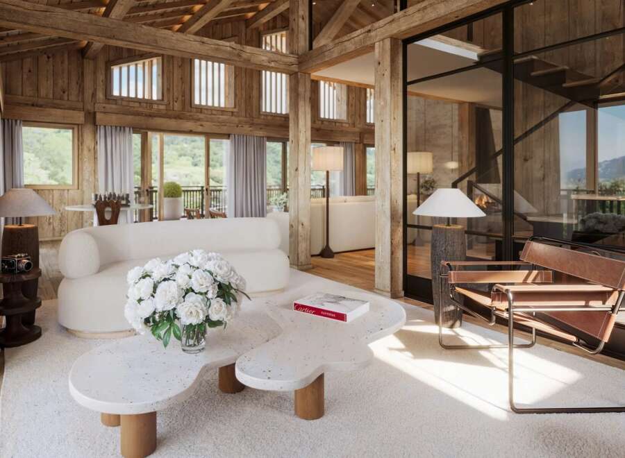 Experience luxury living in this stunning property, featuring a beautifully designed interior with exposed wooden beams and a cozy ambiance.