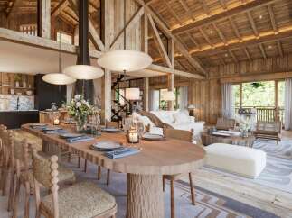 Experience rustic elegance in this stunning property, featuring a spacious open-plan living area with exposed wooden beams and a cozy fireplace.