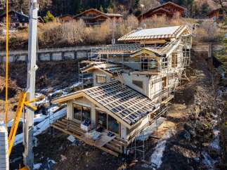 Discover this stunning property under construction, boasting a modern design with a focus on natural light and spacious living areas.