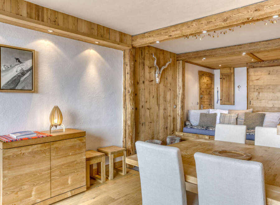 This stunning property boasts a rustic charm with its wooden accents and cozy atmosphere.