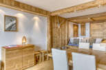This stunning property boasts a rustic charm with its wooden accents and cozy atmosphere.