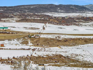 Discover the beauty of this stunning property nestled in a picturesque winter landscape.