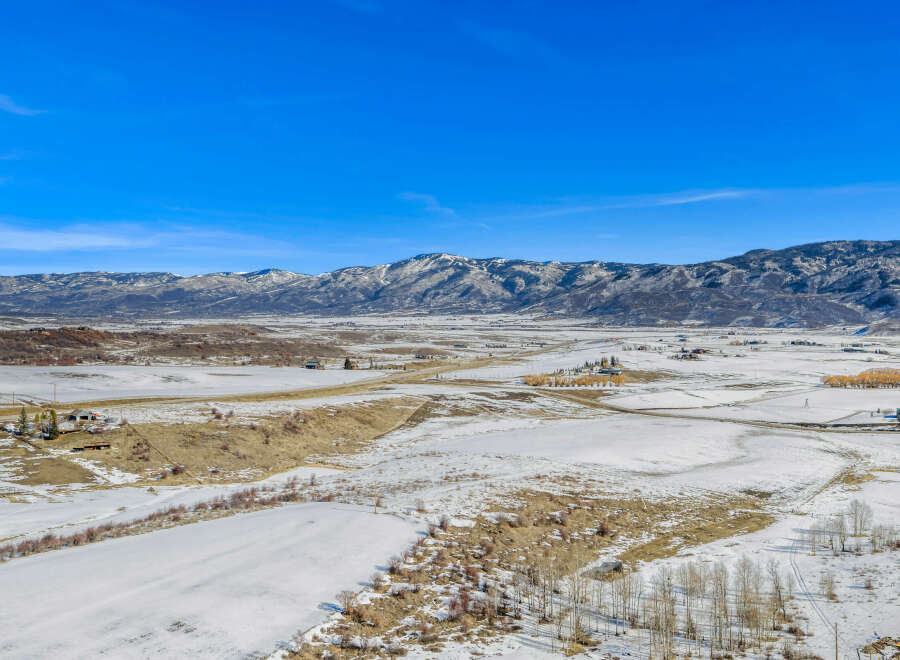 Discover the serene beauty of this stunning property nestled in a picturesque winter landscape.