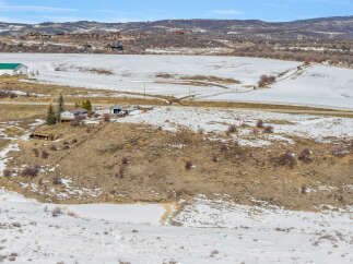 Discover the tranquility of this stunning property, nestled in a picturesque winter landscape.