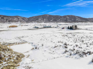 Discover the tranquility of this stunning property nestled in a winter wonderland.