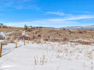 Discover the tranquility of this stunning property nestled in a picturesque winter landscape.