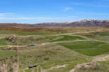 Discover this expansive rural property offering breathtaking mountain views and vast open fields.