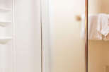 Step into a beautifully designed bathroom featuring a modern shower enclosure.
