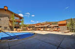 Discover a luxurious retreat with this stunning property featuring a beautiful outdoor pool and ample lounging space.