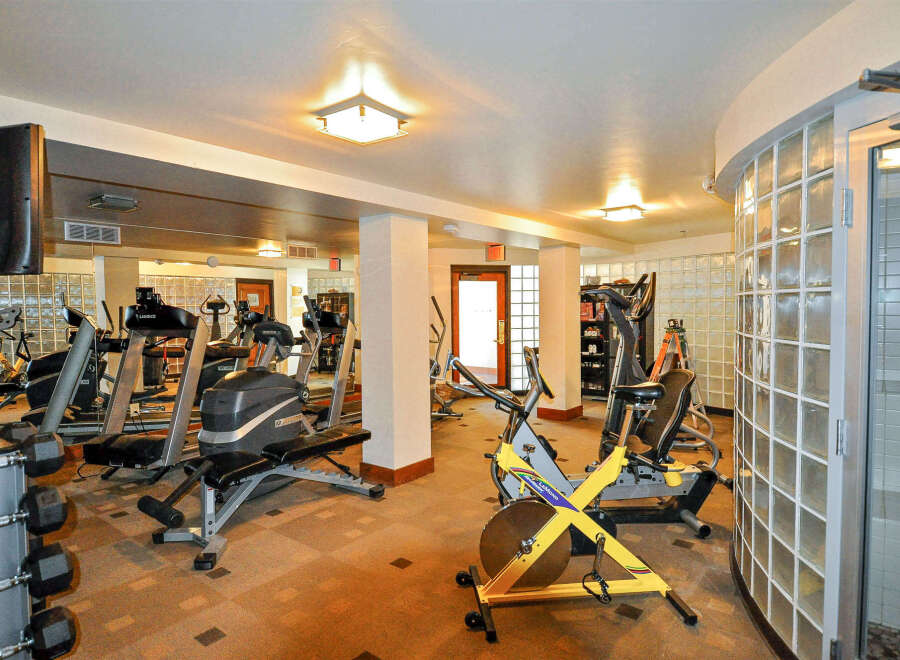 This well-equipped gym offers a variety of workout options, including treadmills, elliptical machines, and stationary bikes.