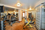 This well-equipped gym offers a variety of workout options, including treadmills, elliptical machines, and stationary bikes.