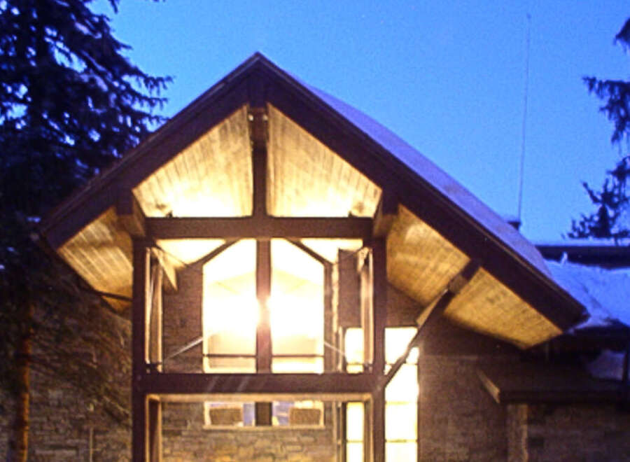 This stunning property boasts a unique architectural design, perfect for those seeking a blend of rustic charm and modern elegance.