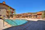 Enjoy a refreshing dip in this stunning outdoor pool, perfect for unwinding after a day of adventure.