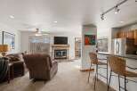 This stunning property boasts a cozy living room with a fireplace, perfect for relaxing evenings.