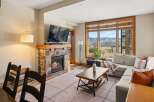 Experience luxury living in this stunning property featuring a cozy fireplace, perfect for chilly evenings.