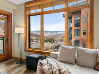 Experience breathtaking mountain views from this stunning property.