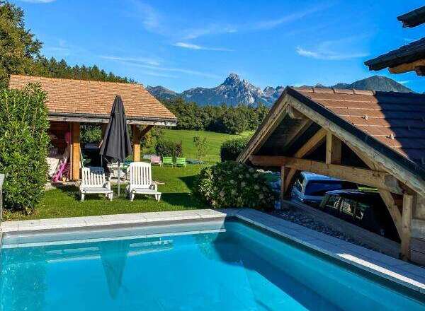 Experience luxury living in this stunning property featuring a private pool and breathtaking mountain views.
