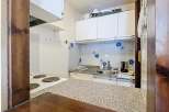 Discover this charming kitchen space, perfect for culinary adventures.