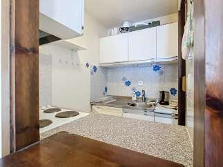 Discover this charming kitchen space, perfect for culinary adventures.