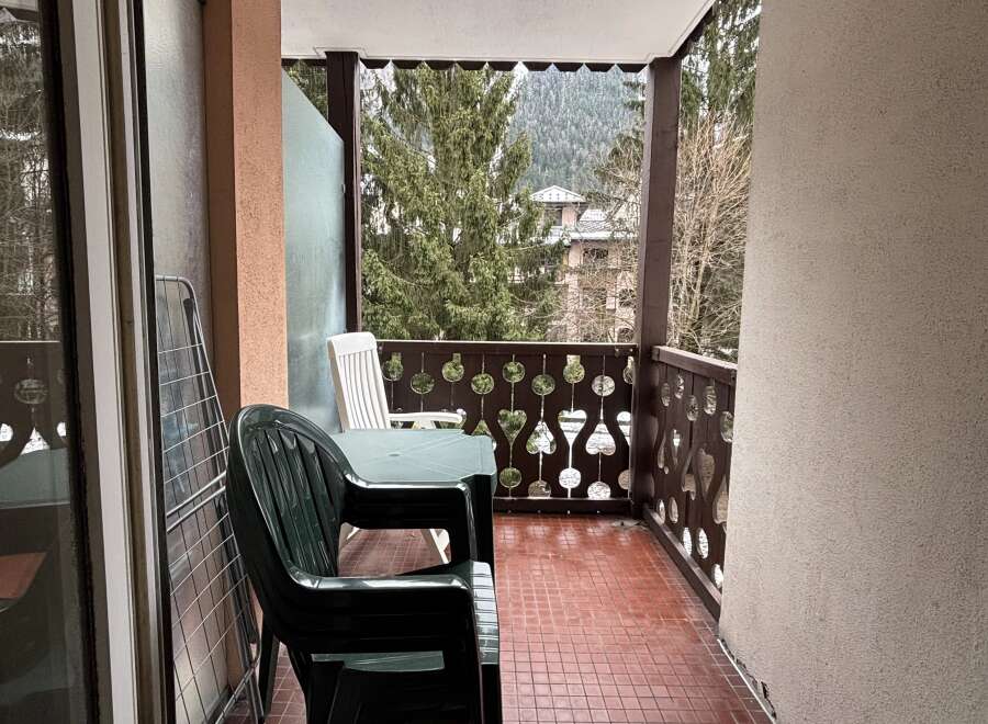 Enjoy the serene views from this charming balcony.