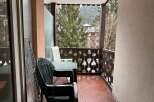 Enjoy the serene views from this charming balcony.