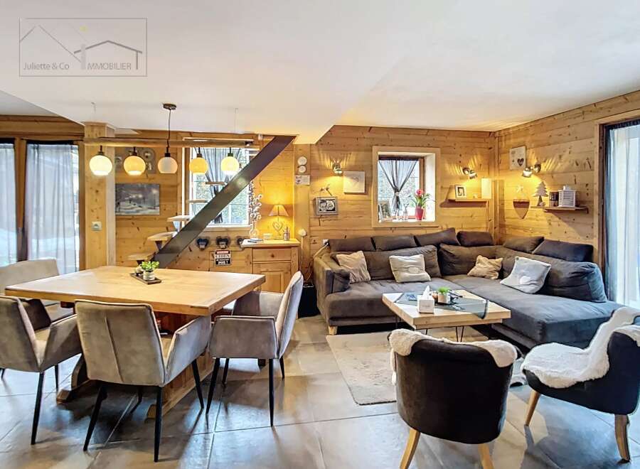Step into this cozy chalet-style living space, perfect for relaxation and entertaining.