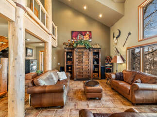 Step into rustic elegance with this stunning living room.