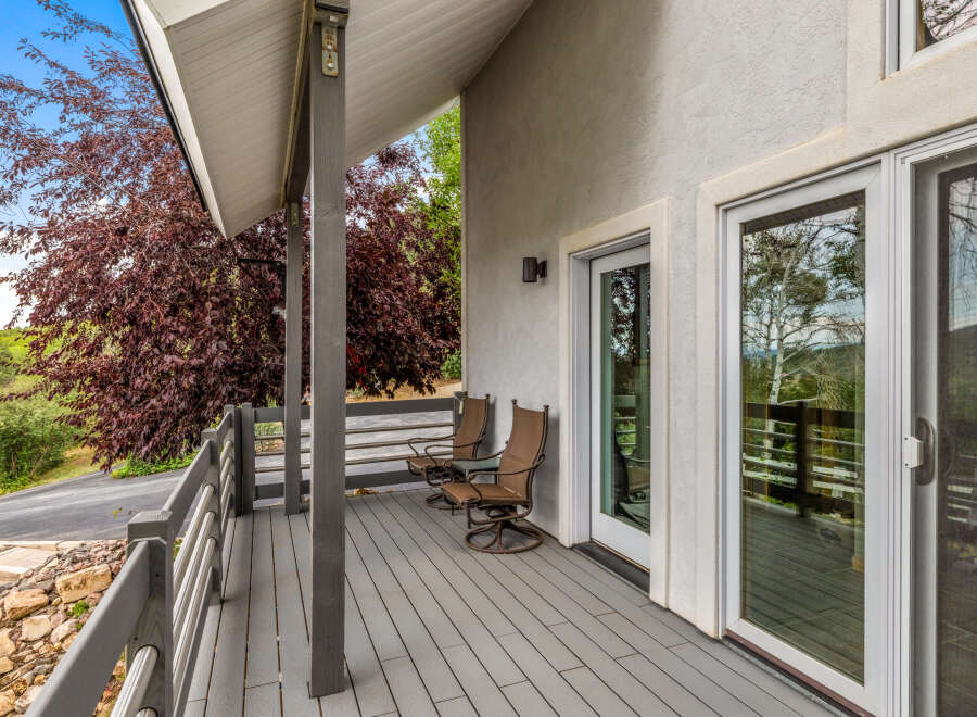 Enjoy the tranquility of this stunning outdoor space! This property features a beautiful deck, perfect for relaxing or entertaining.