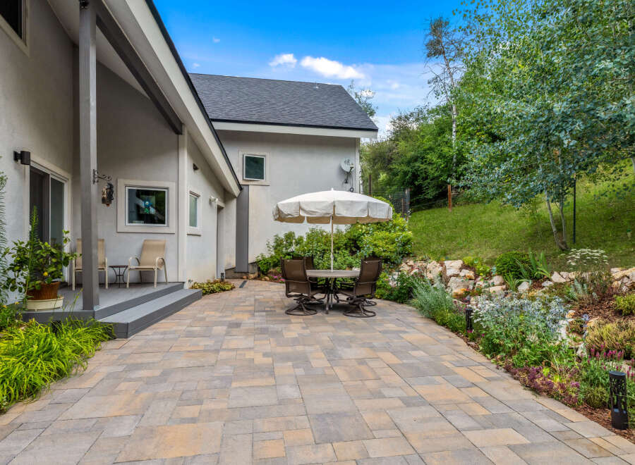 Enjoy outdoor living at its finest with this stunning property featuring a beautifully designed patio.